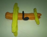 /album/escultura-ate-onde-podemos-ir-com-uma-mola-de-roupa-/a101-jpg/