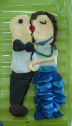 BAILE DO AMOR e no meio há um beijinho